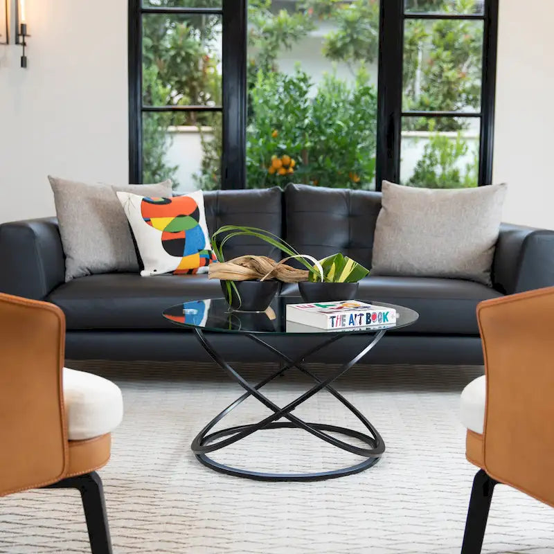 Round Tempered Glass Coffee Table with Sculptural Cross Base – 31.5 Inch