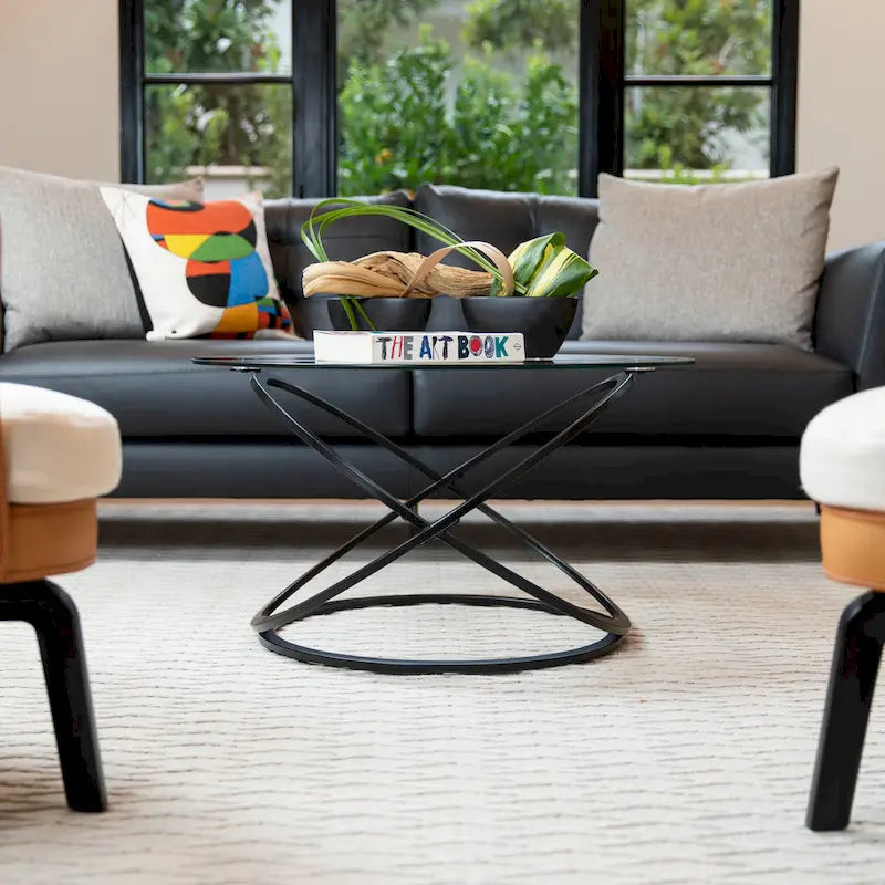 Round Tempered Glass Coffee Table with Sculptural Cross Base – 31.5 Inch