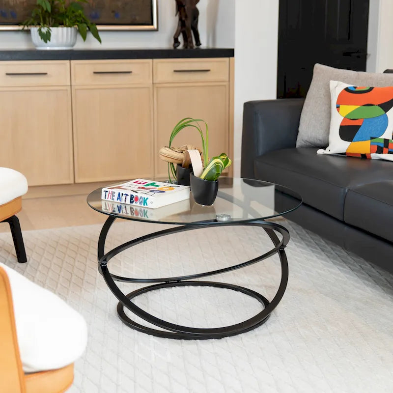 Round Tempered Glass Coffee Table with Sculptural Cross Base – 31.5 Inch
